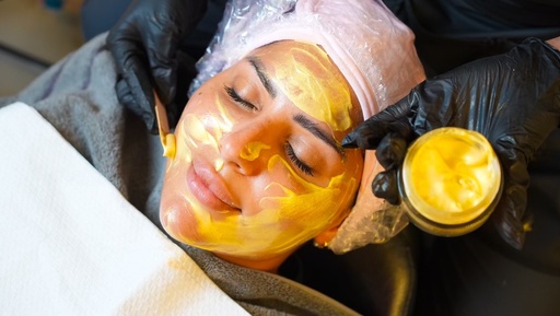 Deep facial cleansing with a gold mask